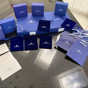 EMPTY Swarovski boxes. 5 large and 5 small, 5 velvet pouches and 3 gift bags.